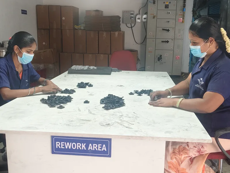Rework area signage inside the Aaru Plastics spray painting unit